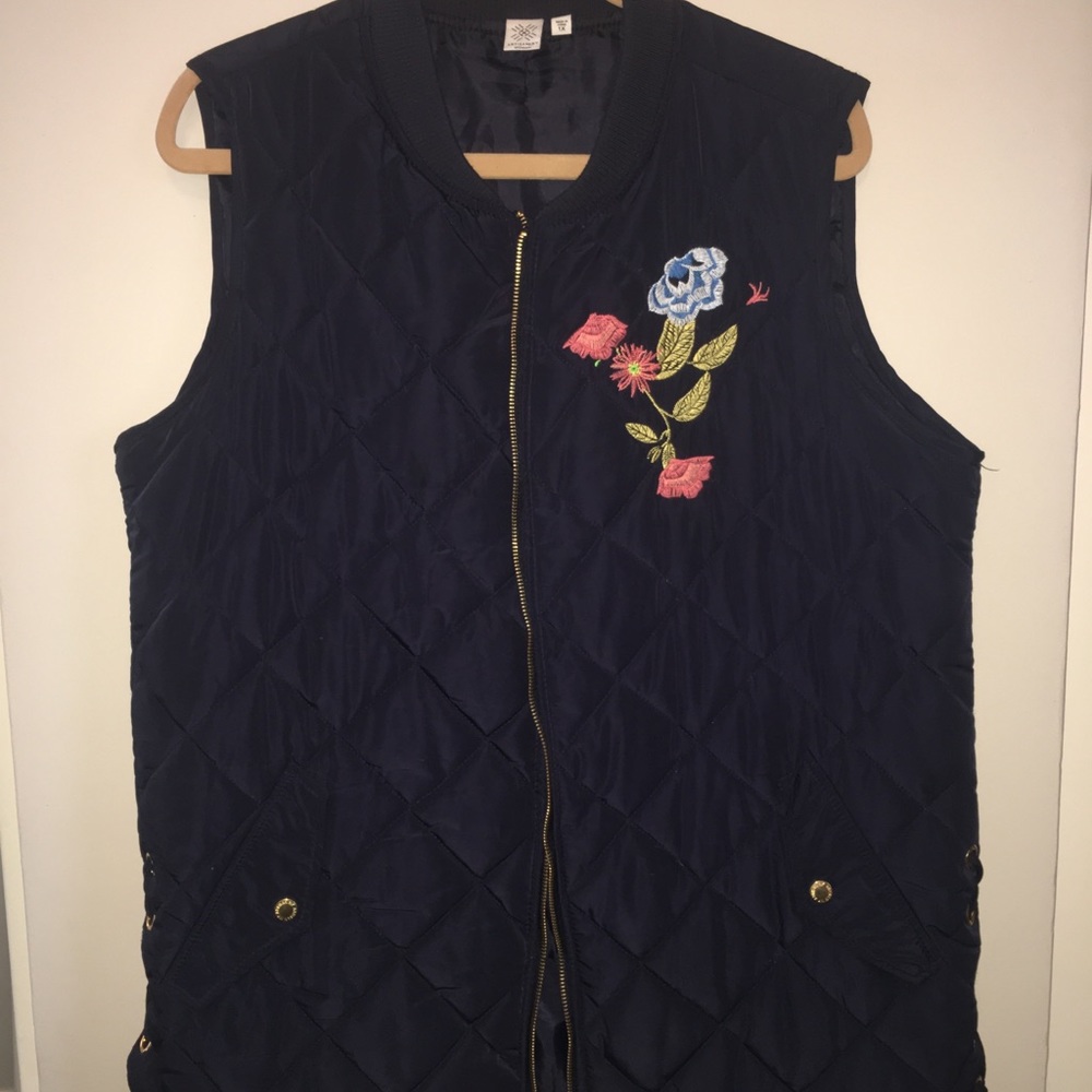 Navy blue quilted vest
